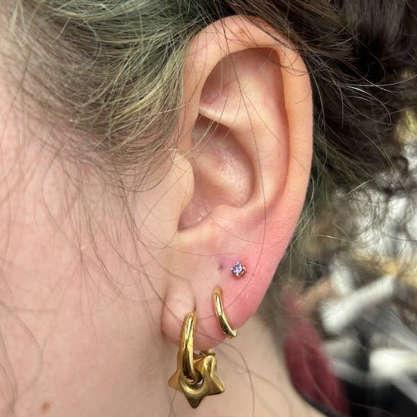 3rd lobe piercing by paola, fattys tattoos and piercings