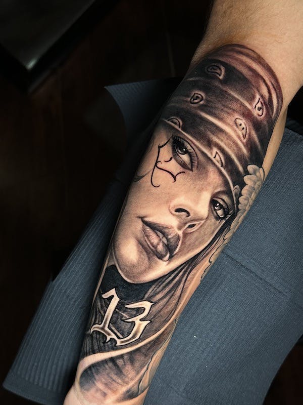 Chola girl tattoo by Alex, artist at Fattys Tattoos & Piercings