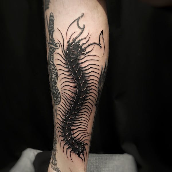 Creepy centipede tattoo by Alex, artist at Fattys Tattoos & Piercings