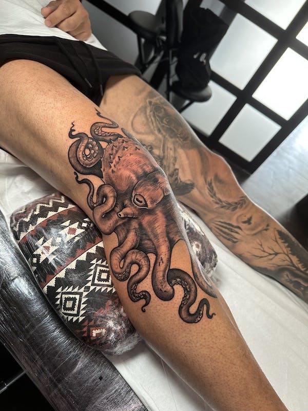 Octopus kneecap tattoo by Alex, artist at Fattys Tattoos & Piercings